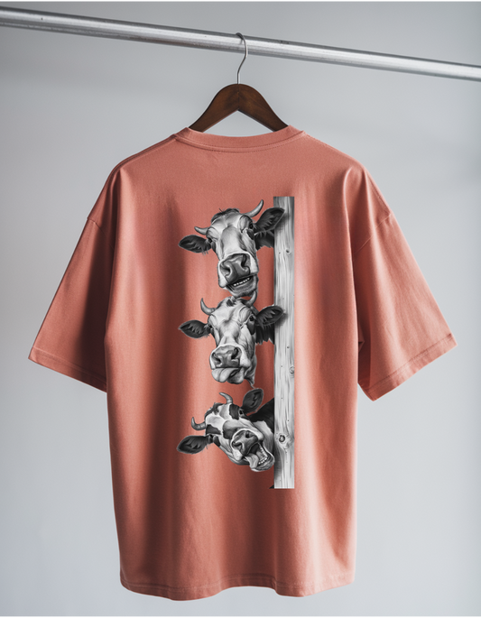 Moo-velous Humor: Coral Tee with Playful Cow Faces Graphic